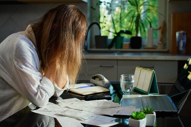 A person sitting at a desk, reviewing documents related to student loans and forgiveness programs. The setting suggests a home office, with a laptop and financial papers visible. The individual appears focused and determined.