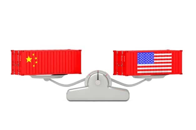 A visual representation of the trade balance between the US and China, shown as two scales with different weights. Graphics should clearly indicate the value of imports and exports for both countries over the last decade.