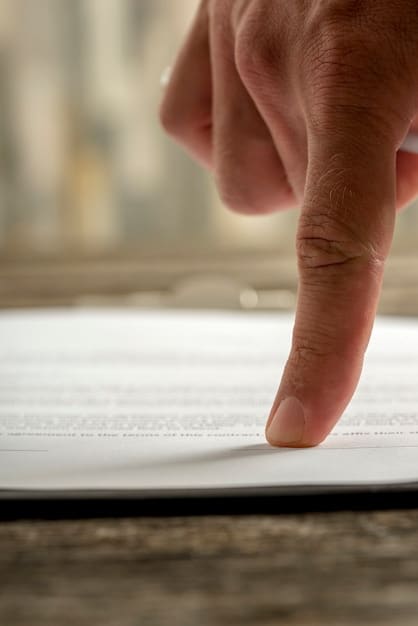 A close-up of a hand filling out a government application form. A pen rests on the document, and the background is slightly blurred to focus attention on the application.