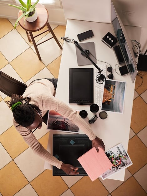 A person sitting at a desk, surrounded by various content creation tools such as a camera, microphone, graphics tablet, and a notepad with hand-written notes. The scene conveys a sense of creativity and productivity.