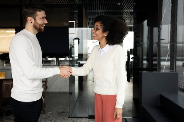 Two professionals shaking hands after a successful meeting, symbolizing networking and relationship building. The scene is a modern office setting.