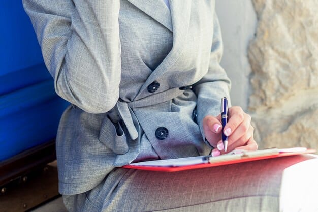 A close-up shot of a person writing notes in a professional notebook, with a pen in hand, focusing on planning and strategy elements. The lighting is warm and inviting, suggesting thoughtful preparation.