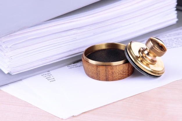 A close-up of a gavel resting on a stack of legal documents, symbolizing the legislative process and the enactment of laws. The background is slightly blurred, focusing attention on the gavel and documents.