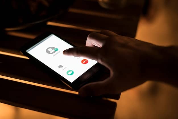A person's hand holding a smartphone with the screen displaying a secure messaging app, suggesting confidential communication. The setting appears to be a dimly lit, private office.