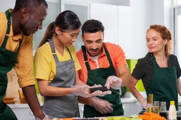 A group of restaurant employees participating in a food safety training session, with a trainer demonstrating proper handwashing techniques.