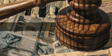 Fed Holds Steady at 5.5%: Mortgage and Loan Impact in the US - Cover Image