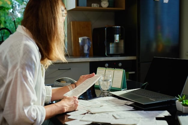 A person organizing receipts and financial documents on a desk, highlighting the importance of record-keeping for tax purposes.