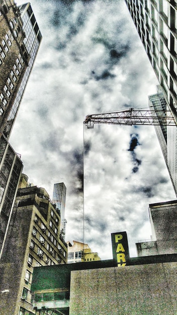 A split image showing two contrasting scenarios: on one side, a busy construction site with equipment and workers, symbolizing sectors hit hard by the rate hike; on the other side, a tech startup office with employees collaborating, symbolizing sectors that may benefit from the shift.